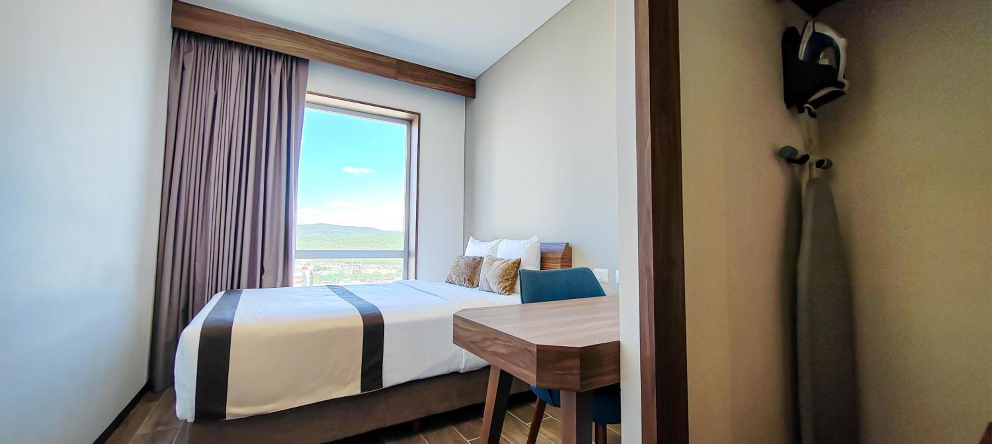 Hotel FUJITAYA Querétaro Jurica Exterior foto A bedroom at the hotel