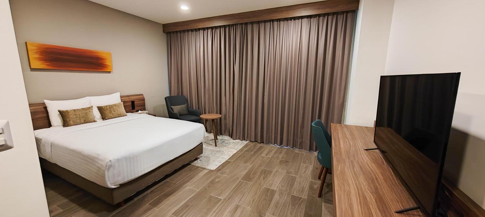 Hotel FUJITAYA Querétaro Jurica Exterior foto A bedroom at the hotel